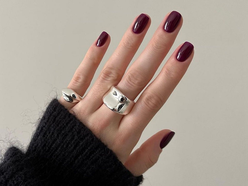 Sleek Burgundy Nails with 2025 Jewel Touches