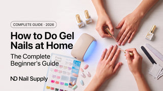 Overhead view of a woman doing her own gel nails at home with an LED lamp and starter kit — beginner's guide 2026, ND Nail Supply