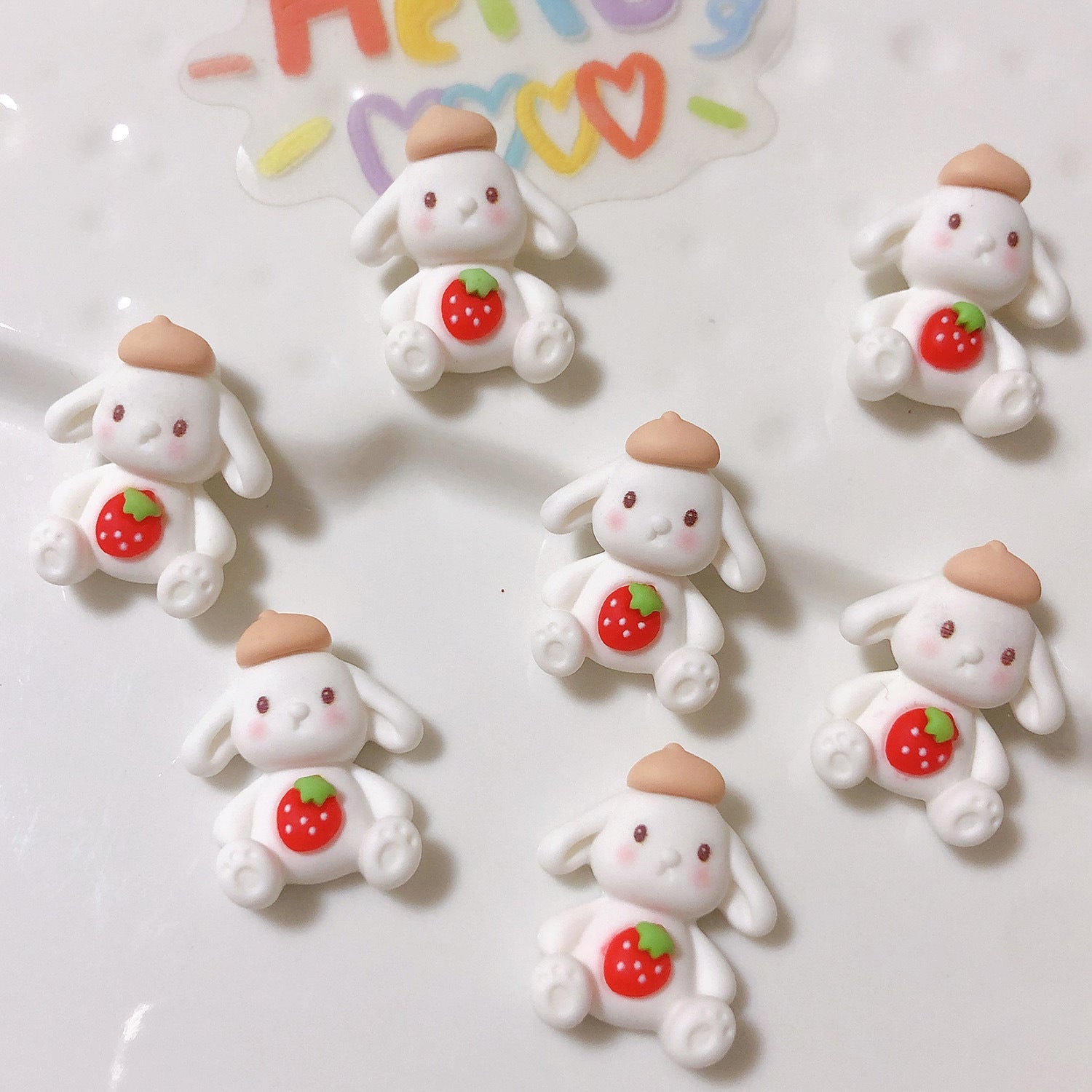 #433 White Dog with Strawberry Charm